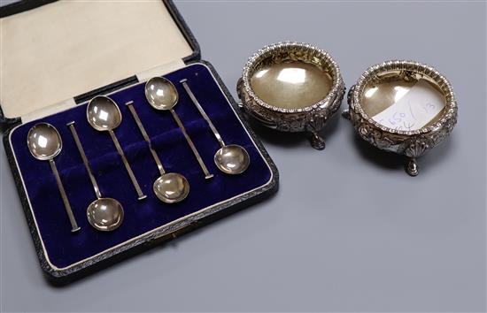 A pair of Victorian silver bun salts, Sheffield, 1877 and cased set of six silver coffee spoons.